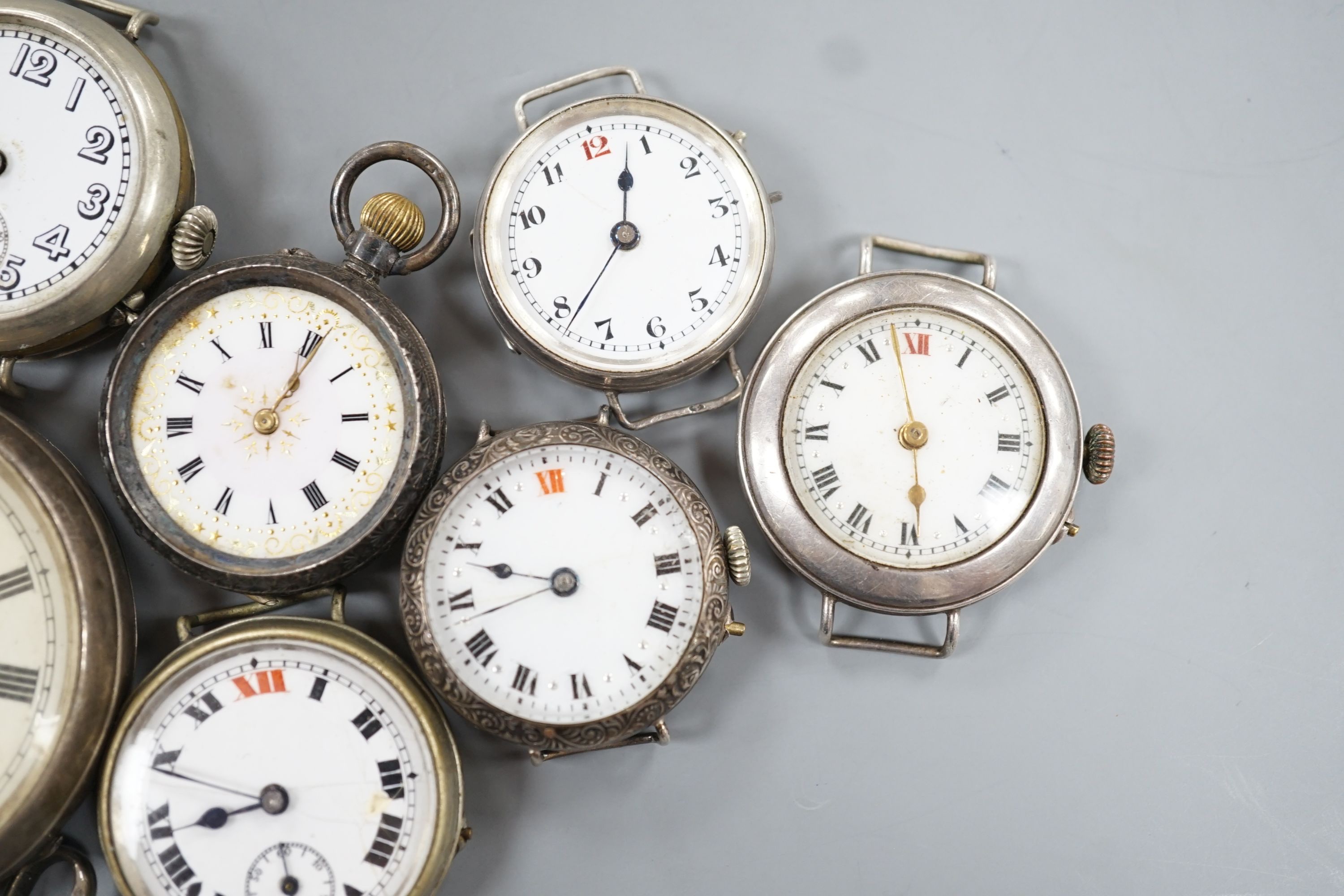 Four assorted early 20th century silver wrist watches, a silver fob watch, two base metal wrist watches, brooch, pendant and two pocket watches including one silver open face.